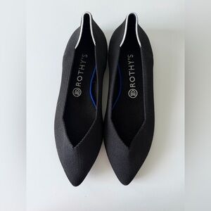 Rothy's Black Pointed Flats with White Trim